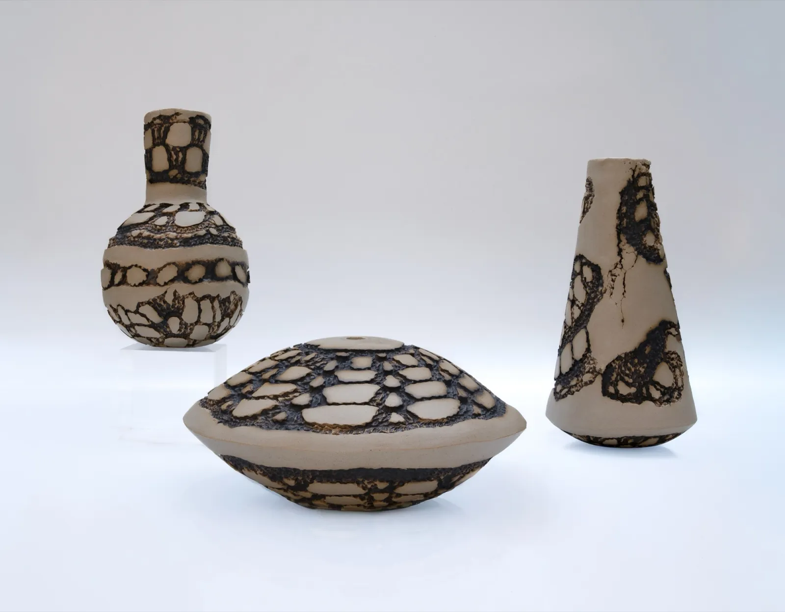 Hana Renko, Trace of Fire, Stoneware, oxides, glazed insides, 2026