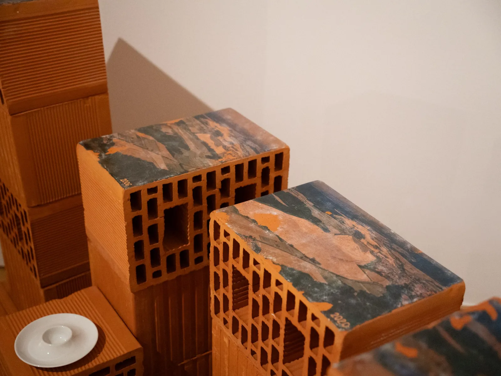 Hana Renko, White Trace, Spatial installation; video, sound, found objects, quarry waste material, 2026